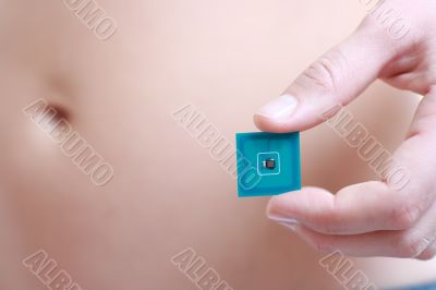 woman holding RFID tag