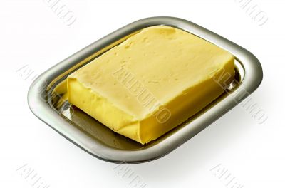 Butter on silver butter dish isolated