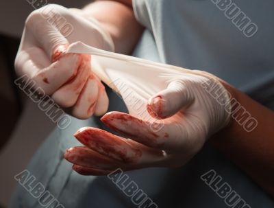 Abstract of Doctors Bloody Surgical Gloves