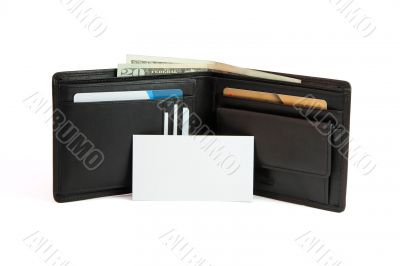 White business card in front of wallet isolated