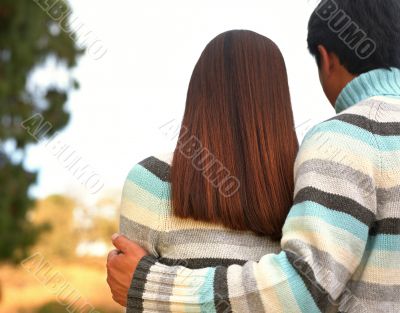 Couple Dressed in Matching Sweaters