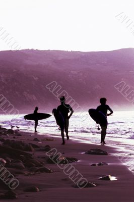 Surfers with Surfboards