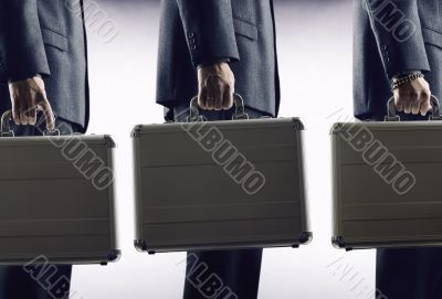 Rat Race . Businesspeople with luggage