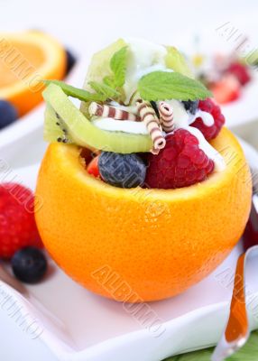 Orange filled with fruits Orange filled with fruits