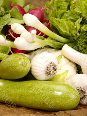 fresh tasty vegetables on brown background