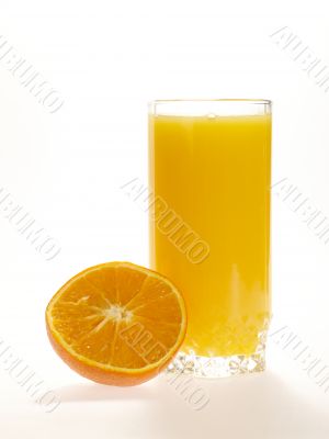 Orange juice with half of orange fruit