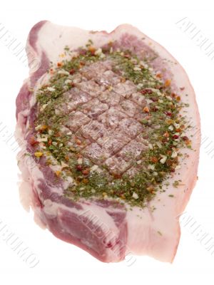 Meat roll in bacon with spices isolated on white