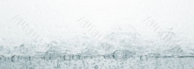 Bubbles and the splashes on glass