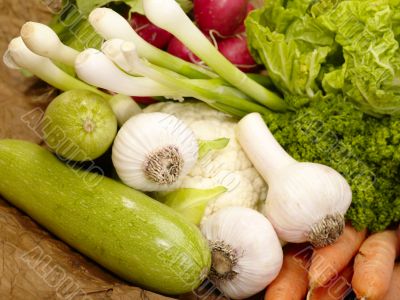 fresh tasty vegetables on brown background fresh tasty vegetables on brown background
