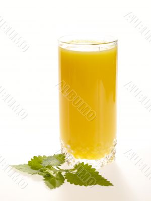 Orange juice on the table with fresh mint