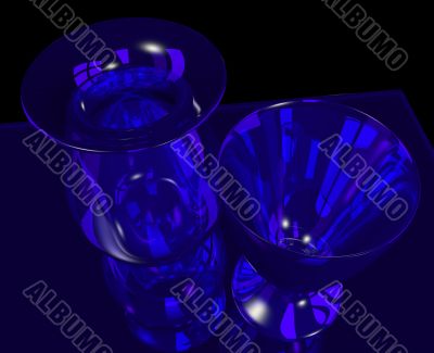 blue glass vase and goblet