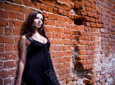 Charming woman in black dress