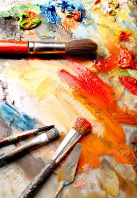 Paint brushes on art palette