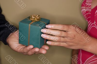 gift giving. Couple hands