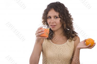 Woman is drinking orange juice.