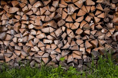 Background with pile of wooden logs