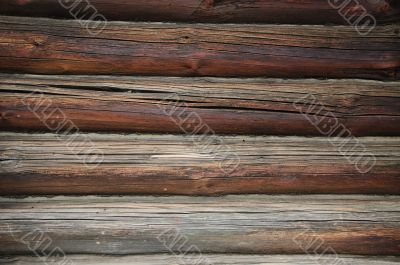 Fragment of old country wooden house wall