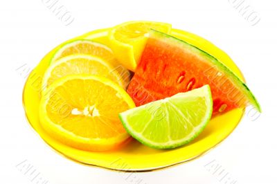 Citrus Fruit on a Yellow Plate