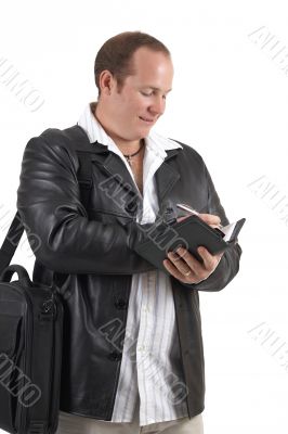 Businessman holding a diary