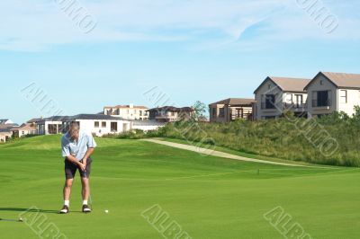 Senior golfer playing golf