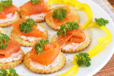 Smoked salmon and cream cheese on crackers Smoked salmon and cream cheese on crackers