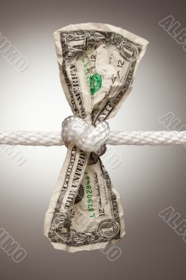 American Dollar Tied in Rope