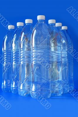 Mineral water bottle isolated on white background, close up