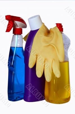 close up of hygiene cleaners and gloves for housework on white b