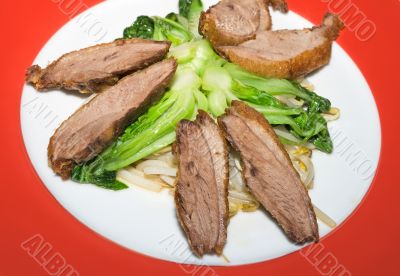 Crisp duck with baby pok choi
