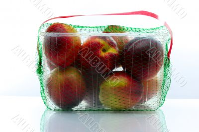peaches packed in a plastic container