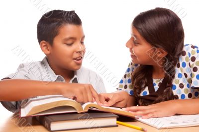 Hispanic Brother and Sister Having Fun Studying