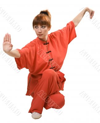 young woman makes kung-fu exercise