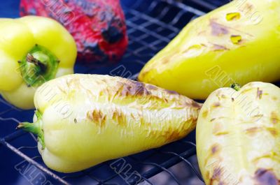 Vegetable skewers being cooked on a grill