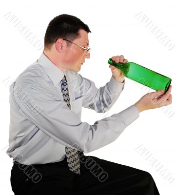 portrait of man in glasses with a bottle