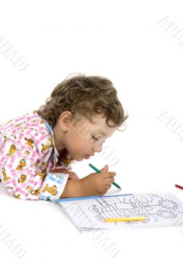 Boy with colouring book close up