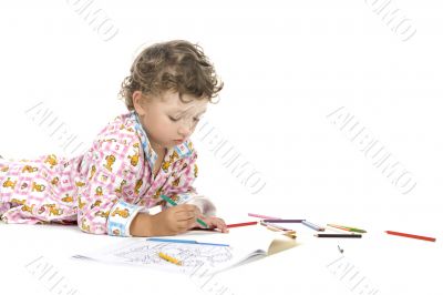 Boy with colouring book closeup
