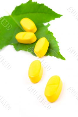 yellow vitamin pills