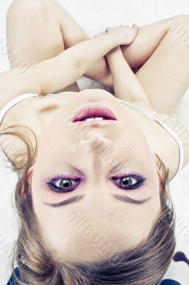 Young woman laying bed