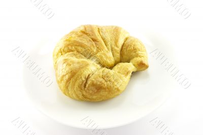 Croissant on a White Plate