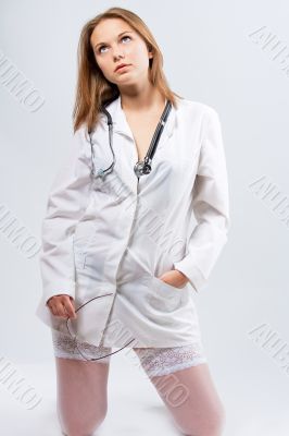 sexy young blonde doctor with endoscope