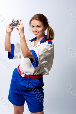 smiling pretty blonde female sailor with camera