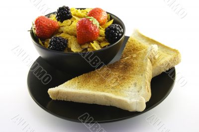 Cornflakes in a Black Bowl with Toast
