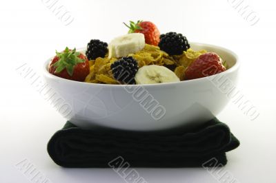 Cornflakes and Fruit in a White Bowl