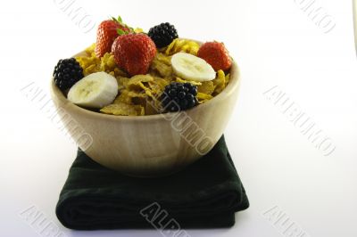 Cornflakes and Fruit in a Bowl with Napkin