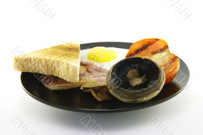 Breakfast and Toast on a Black Plate