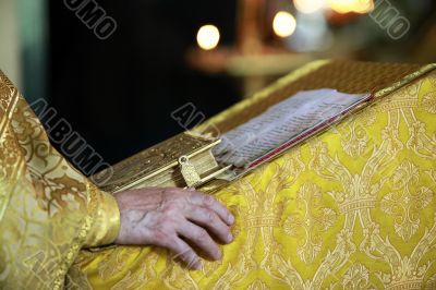 Priest with Bible