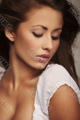 Closeup portrait of a attractive young woman relaxing