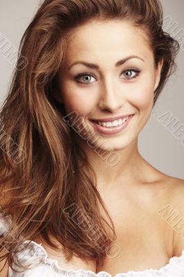 Closeup portrait of a attractive young woman relaxing