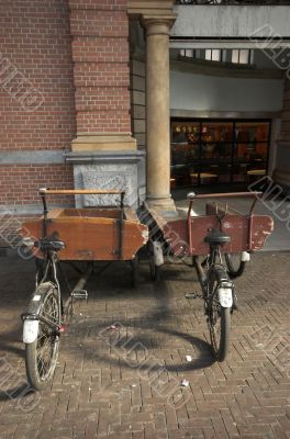 Two antique bicycle trailers Two antique bicycle trailers