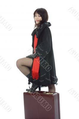Beautifu lbrunette with valise